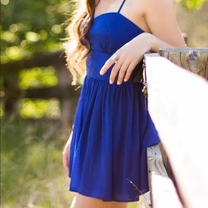 ANGL small navy blue romper with open back